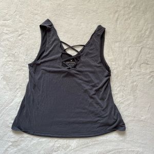Gray tank with scalloped neck and criss cross detail